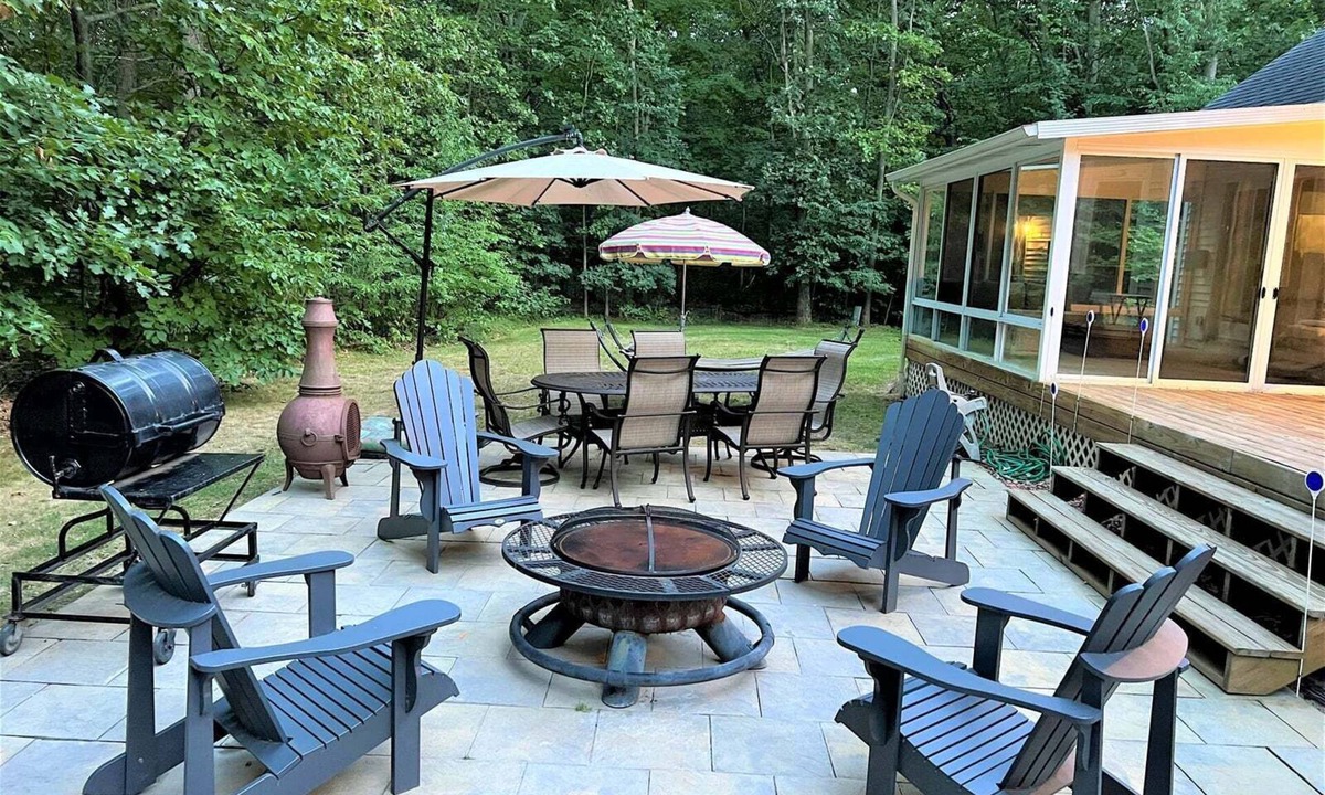 Saugatuck House | Experience luxury at Riverwalk, a 4-bedroom retreat in serene Saugatuck, MI.