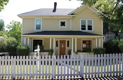 Historic Downtown District Apartment | 3 bedrooms include a king and two queen size beds, 2 bathrooms, and kitchenette.